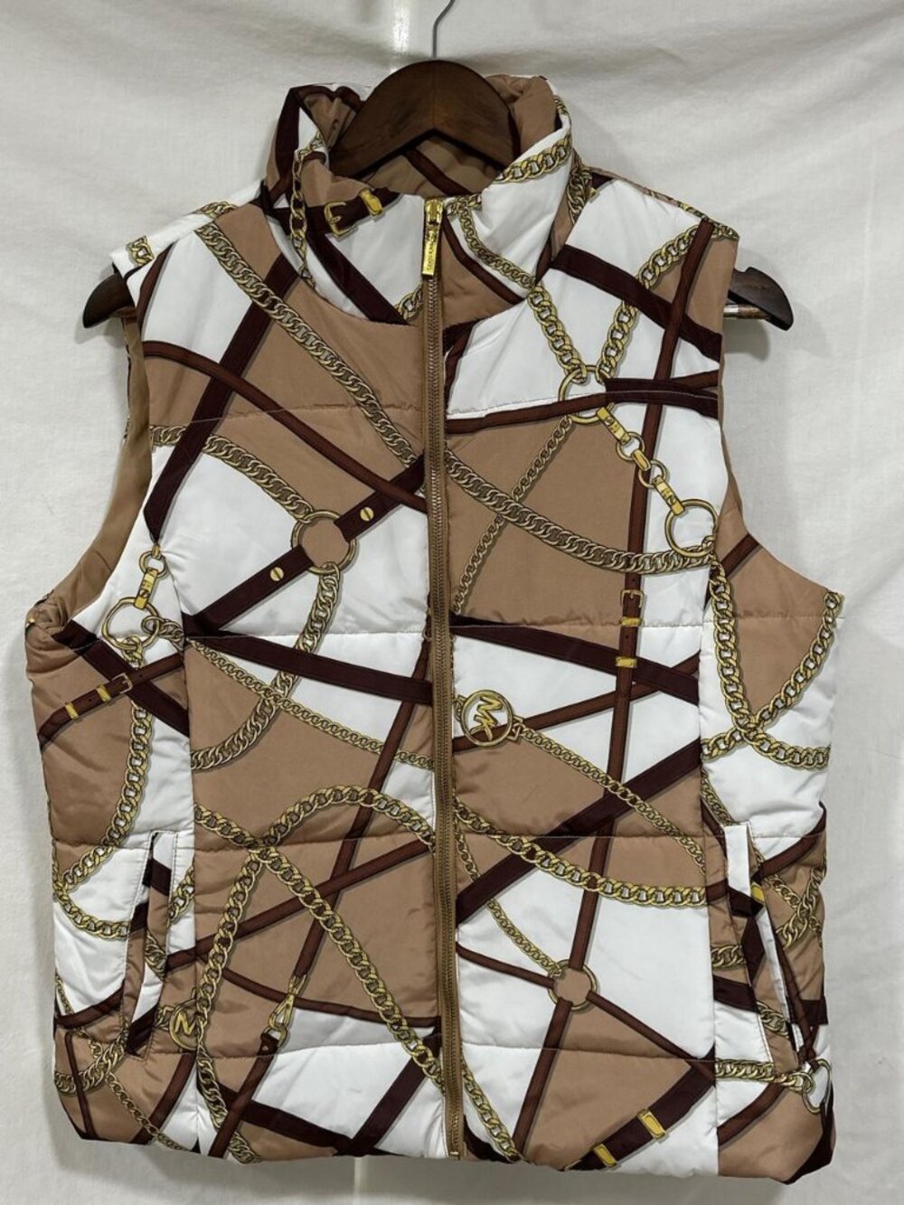 Brown and white puffer vest with gold chain #michaelkors